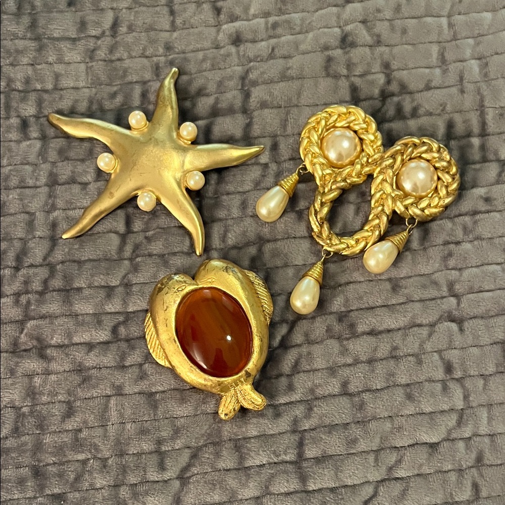 Three Gold brooches